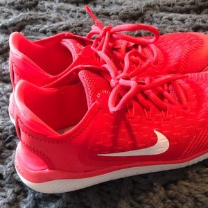 Brand new coral nike running shoes
